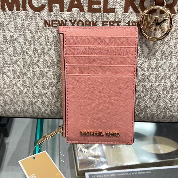 MICHAEL KORS
Jet Set Travel Medium Top Zip Leather Card Case Wallet
Primrose
NWT - Picture 7 of 16